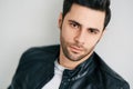 Closeup portrait of handsome thoughtful man posing on white studio background Royalty Free Stock Photo