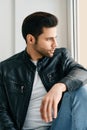 Closeup portrait of handsome trendy man posing on white studio background Royalty Free Stock Photo