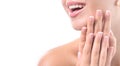 Closeup portrait of a happily smiling girl with french manicure on a white background. Copy space