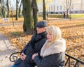 Closeup portrait of happy blonde mature woman and beautiful middle-aged brunette, looking away. Loving couple of 45-50 years old Royalty Free Stock Photo