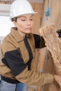 Closeup portrait happy female construction worker at site Royalty Free Stock Photo