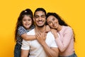 Closeup Portrait Of Happy Middle Eastern Family Of Three With Adorable Daughter Royalty Free Stock Photo