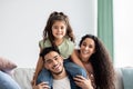 Closeup Portrait Of Happy Middle Eastern Parents And Their Cute Little Daughter Royalty Free Stock Photo