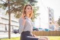 Closeup portrait happy woman, buyer near her new car showing key Royalty Free Stock Photo