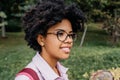 Closeup portrait of happy young African American student female smile and getting ready to go to college. Beautiful woman with Royalty Free Stock Photo