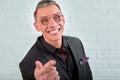 Closeup portrait of a happy young businessman with glasses looking at the camera on white background Royalty Free Stock Photo