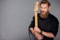 Closeup portrait of hipster man with guitar Royalty Free Stock Photo