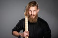 Closeup portrait of hipster man with guitar Royalty Free Stock Photo