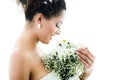 Closeup portrait of hispanic bride holding flower