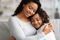 Closeup portrait of hugging african american mother and daughter Royalty Free Stock Photo