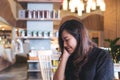 Closeup portrait image of a smiley beautiful Asian woman with feeling good Royalty Free Stock Photo