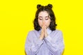 Closeup portrait of latin young woman praying, eyes closed, calm, hoping for best in future, asking forgiveness, miracle isolated Royalty Free Stock Photo