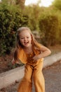 Closeup portrait of a little baby girl on wheat summer field. Adventure, travel, tourism, hike and people concept - happy family Royalty Free Stock Photo