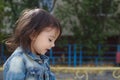 closeup portrait of little cute emotional girl with pigtails in a denim jacket Royalty Free Stock Photo
