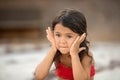 Closeup portrait of little toddler girl at the beach at summer vacation, childhood memories Royalty Free Stock Photo