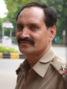 Closeup portrait of a Police officer, New Delhi Royalty Free Stock Photo