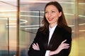 smiling young business woman welcoming guests to a meeting