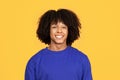 Closeup portrait of positive young African American guy sincerely smiling at camera Royalty Free Stock Photo