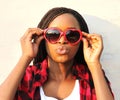 Closeup portrait pretty young african woman in red sunglasses Royalty Free Stock Photo