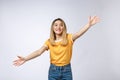 Closeup portrait of pretty young woman motioning with arms to come and give her a bear hug, isolated on white background