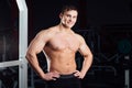 Closeup portrait of professional bodybuilder workout with barbell at gym. Confident muscular man training . Looking Royalty Free Stock Photo