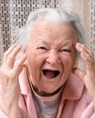 Closeup portrait of scared old woman Royalty Free Stock Photo