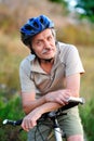 Closeup portrait of a senior man cyclist