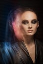 Closeup portrait of a serious lady with smoky eye makeup Royalty Free Stock Photo