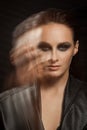 Closeup portrait of a serious lady with smoky eye makeup Royalty Free Stock Photo