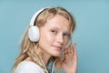 Closeup portrait of side view young woman closed eyes listening music Royalty Free Stock Photo