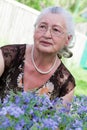 Closeup portrait of a smiling elderly woman Royalty Free Stock Photo