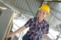 Closeup portrait smiling female construction worker at site Royalty Free Stock Photo