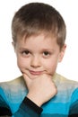 Closeup portrait of a smiling pensive boy Royalty Free Stock Photo