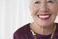 Closeup Portrait Of Smiling Senior Woman