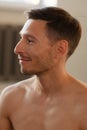 Closeup portrait of a smiling yoga trainer and stubble on his face