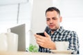 Closeup portrait, stressed young man in purple sweater, shocked surprised, horrified and disturbed, by what he sees on Royalty Free Stock Photo