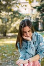 Closeup portrait of stressed young woman looking her wristwatch Royalty Free Stock Photo