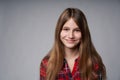 Closeup portrait of a teen girl in checkered shirt Royalty Free Stock Photo