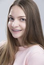 Closeup Portrait of Teenage Female Having Teeth Brackets