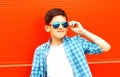 closeup portrait teenager boy in a sunglasses on a colorful Royalty Free Stock Photo