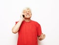 Closeup portrait upset, sad, depressed, worried senior man, old employee, worker talking on phone Royalty Free Stock Photo