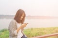 Closeup portrait upset sad skeptical unhappy serious woman talking texting on phone.