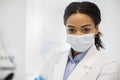 Closeup Portrait Of Young African American Female Doctor In Medical Face Mask Royalty Free Stock Photo
