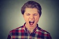 Closeup portrait of a young angry man screaming Royalty Free Stock Photo