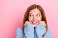 Closeup portrait of young brown hair cute nice teenager girl touch cheeks dreaming looking empty space isolated on Royalty Free Stock Photo