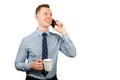 Closeup portrait of young businessman dressed in blue shirt and tie, talking on the mobile phone, isolated on white background Royalty Free Stock Photo