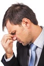 Closeup portrait of young businessman with strong headache Royalty Free Stock Photo