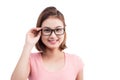 Closeup portrait of a young cheerful asian woman in glasses Royalty Free Stock Photo