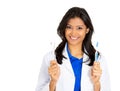 Closeup portrait of young confident, smiling, cheerful female oral health care professional, dentist, showing toothbrush and Royalty Free Stock Photo