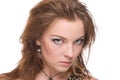 Closeup portrait of young emotional savage woman